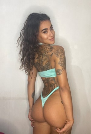 Gorgeous inked Latina Santos Isabella teases with her big ass in a solo - OnlyFans